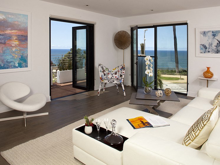 living area with large doors to outdoors at 301 Ocean Apartments in Santa Monica, CA
